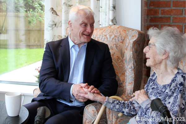 Graham Stuart MP speaking to a resident at Chapter House Care Home