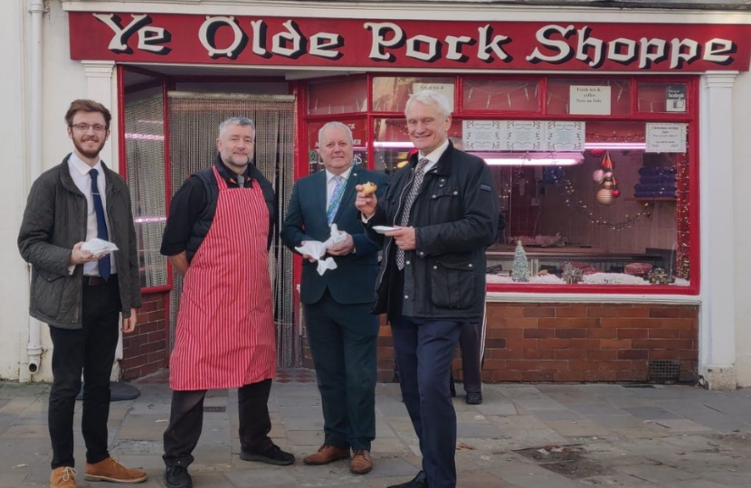 Graham outside Ye Olde Pork Shoppe