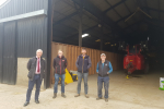 Graham Stuart, Tom Screeton (Agriculture Senior Fieldsperson, Birds Eye), Guy & Chris Shelby (farmers) standing in front of farming equipment